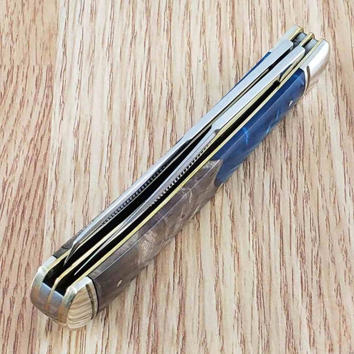 Couteau Rough Rider Pandora Swirl Trapper Lames Clip Point Spey Acier 440 Manche Bois et Résine RR2656 -  Livraison Gratuite