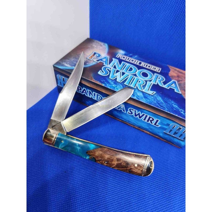 Couteau Rough Rider Pandora Swirl Trapper Lames Clip Point Spey Acier 440 Manche Bois et Résine RR2656 -  Livraison Gratuite