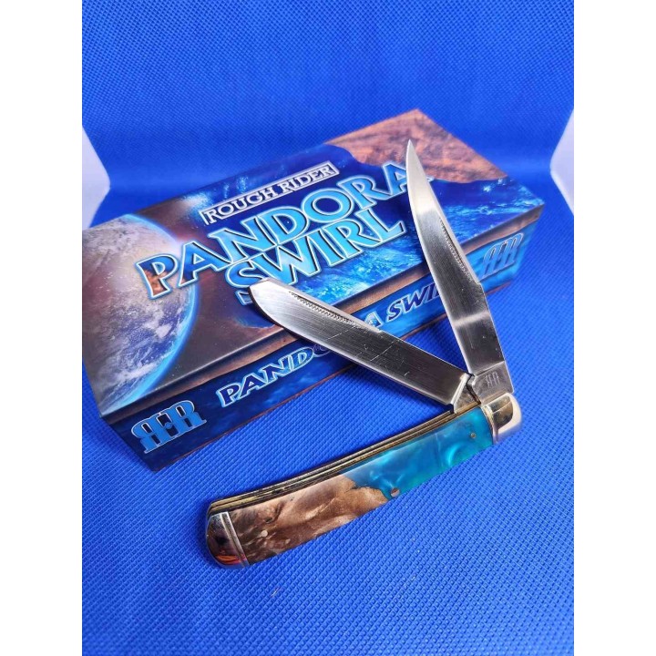 Couteau Rough Rider Pandora Swirl Trapper Lames Clip Point Spey Acier 440 Manche Bois et Résine RR2656 -  Livraison Gratuite