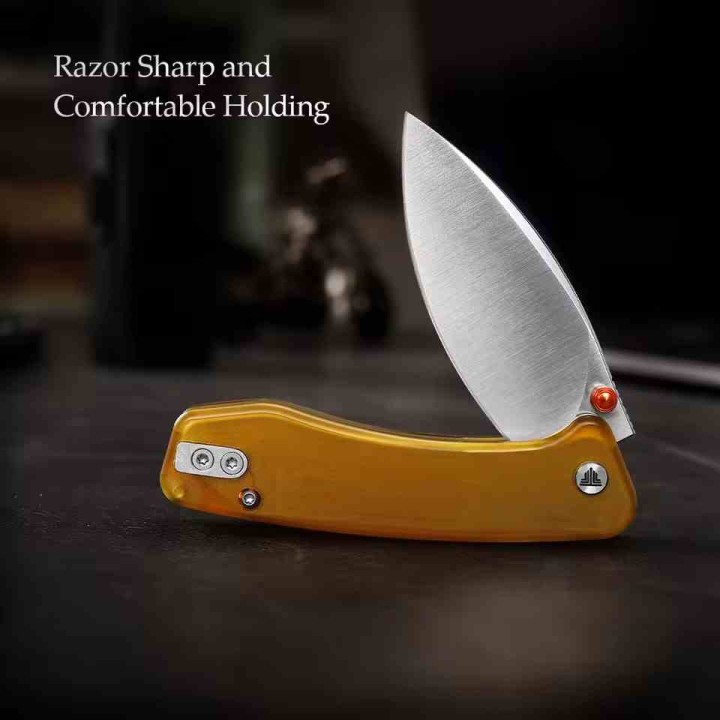 Couteau TRIVISA Koala-Y Ultem Lame Drop Point Acier N690 Crossbar Lock KIVT TVJM02YPN - Livraison Gratuite