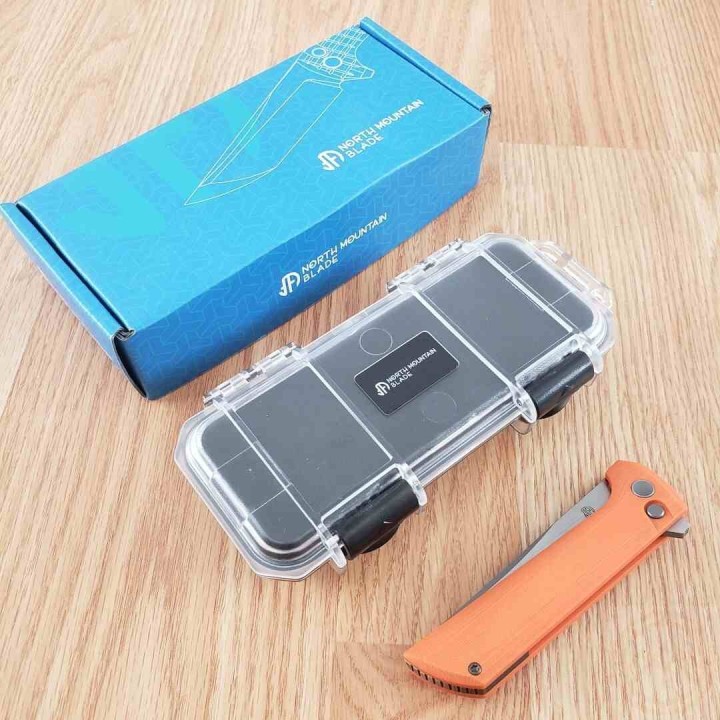 Couteau North Mountain Blade Chop 2 Orange Tanto Lame Acier SLD-Magic SAN MAI Button Lock NMB2406O Livraison Gratuite