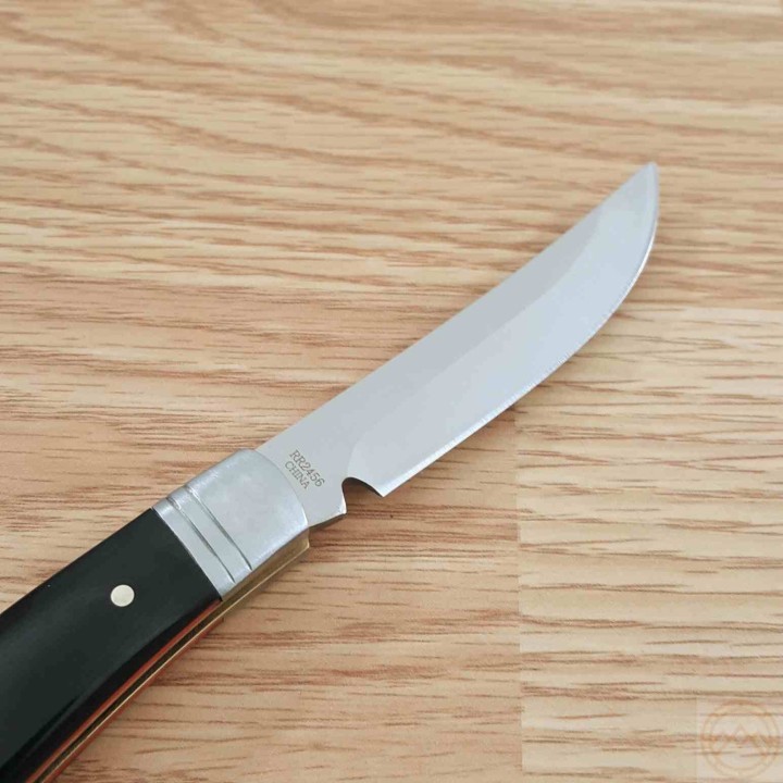 Couteau Rough Ryder Large Bow Trapper Lame Acier Inoxydable Manche Black Micarta Slip Joint RR2456 - Livraison Gratuite
