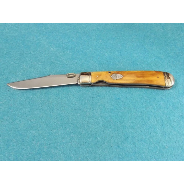 Couteau Rough Rider Trapperlock Lame Acier 440 Manche Os Tobacco RR1131 - Livraison Gratuite