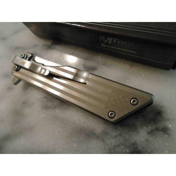 Couteau MTech Framelock Flag Lame Acier 3Cr13 Manche G10 Clip MT1160LF - Livraison Gratuite