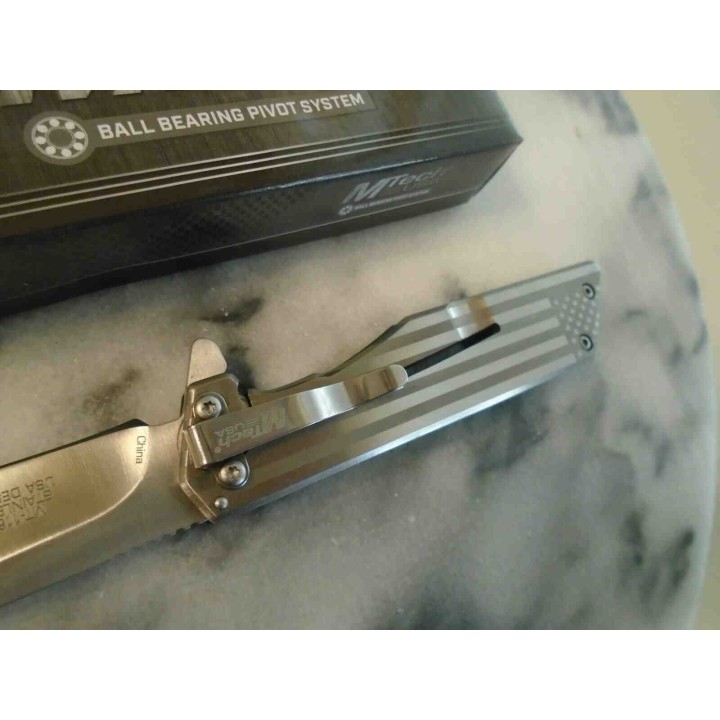 Couteau MTech Framelock Flag Lame Acier 3Cr13 Manche G10 Clip MT1160LF - Livraison Gratuite