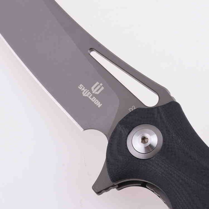 Couteau Shieldon Bazoucan Lame D2 Manche G10 IKBS Linerlock Etui Nylon SHI9050G - Livraison Gratuite