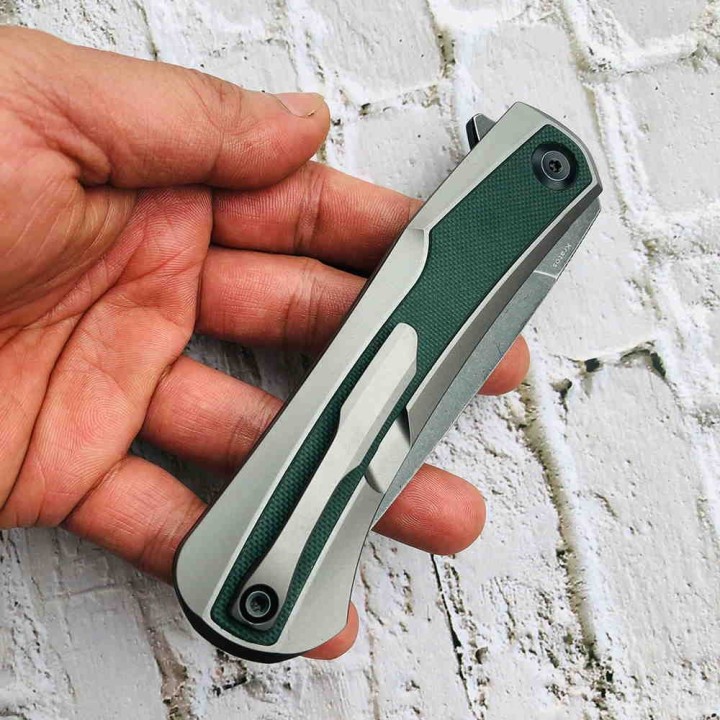 Couteau Kansept Kratos Green Lame Acier S35VN Manche G10/Titane IKBS Clip K1024A2 - Livraison Gratuite