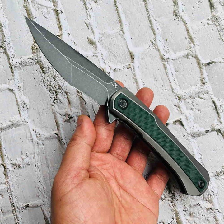 Couteau Kansept Kratos Green Lame Acier S35VN Manche G10/Titane IKBS Clip K1024A2 - Livraison Gratuite