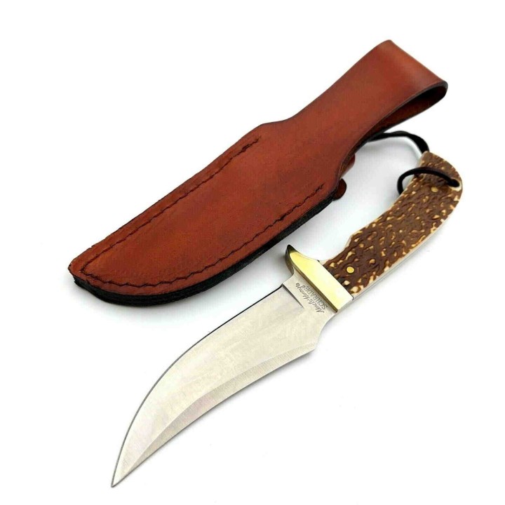 Couteau Schrade Uncle Henry Skinner Acier 7Cr17MoV Manche Delrin Façon Bois de Cerf Etui Cuir SCH1100034 - Livraison Gratuite