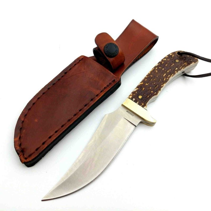 Couteau Schrade Uncle Henry Skinner Acier 7Cr17MoV Manche Delrin Façon Bois de Cerf Etui Cuir SCH1100034 - Livraison Gratuite