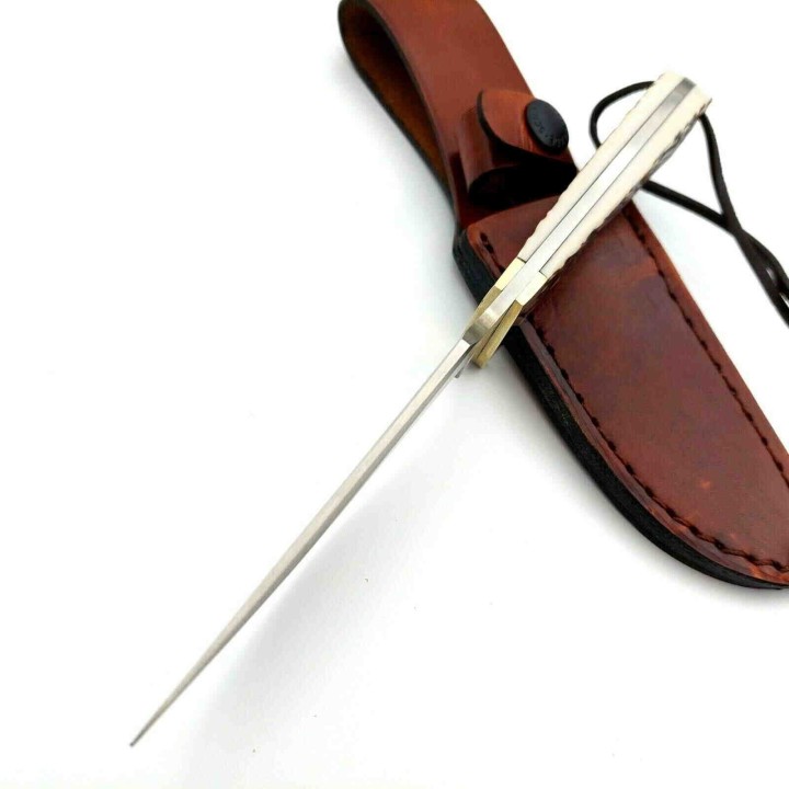 Couteau Schrade Uncle Henry Skinner Acier 7Cr17MoV Manche Delrin Façon Bois de Cerf Etui Cuir SCH1100034 - Livraison Gratuite