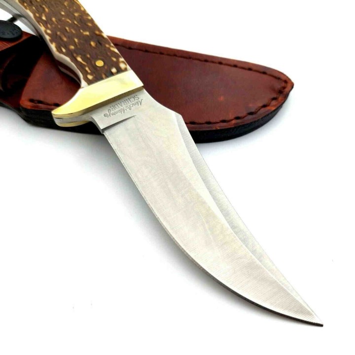 Couteau Schrade Uncle Henry Skinner Acier 7Cr17MoV Manche Delrin Façon Bois de Cerf Etui Cuir SCH1100034 - Livraison Gratuite