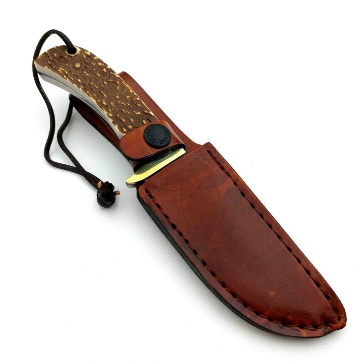 Couteau Schrade Uncle Henry Skinner Acier 7Cr17MoV Manche Delrin Façon Bois de Cerf Etui Cuir SCH1100034 - Livraison Gratuite