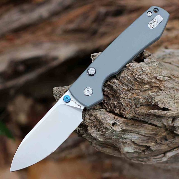 Couteau Pliant Vosteed Raccoon Gray Lame Drop Point Acier 14C28N Manche G-10 Liner Lock VOSA2906 -  Livraison Gratuite