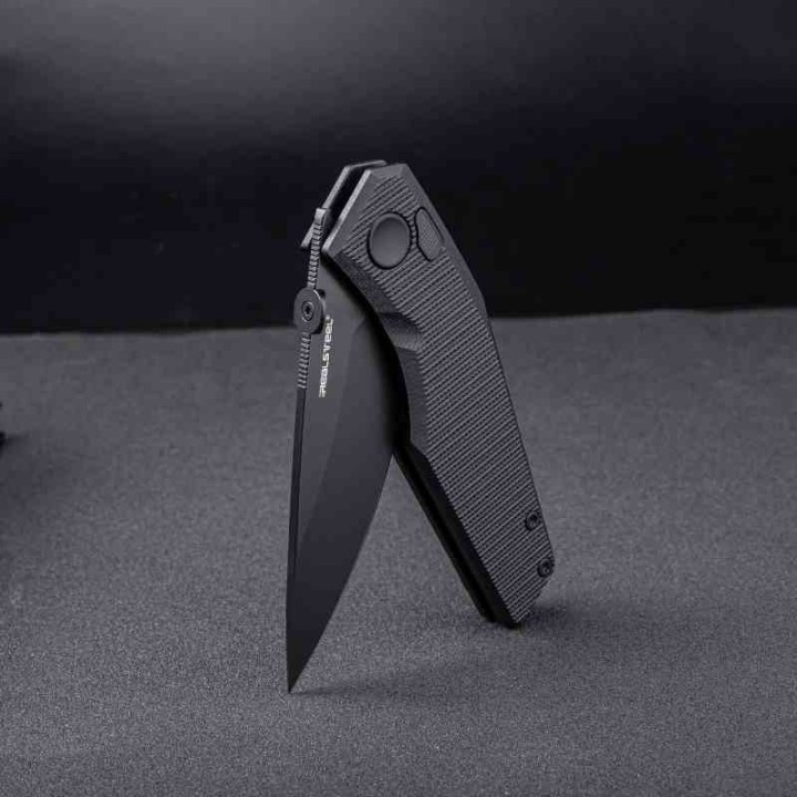 Couteau Real Steel Spectrum Black Lame Acier Nitro V Black Manche G10 IKBS Button Lock RS7142BB - Livraison Gratuite