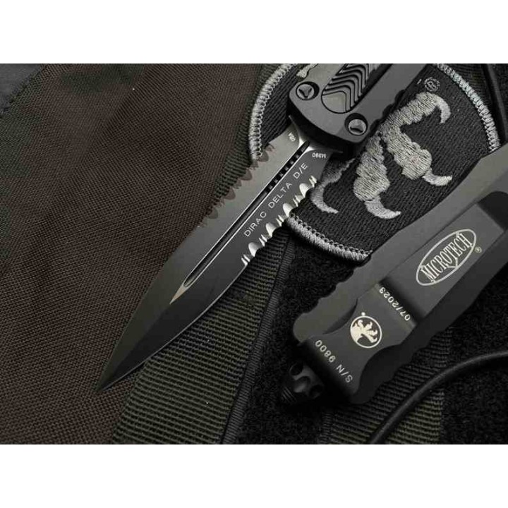 Couteau Automatique OTF Microtech Dirac Delta Lame Dague M390 Noire Serr Manche Alu Noir USA MCT2272T - Livraison Gratuite